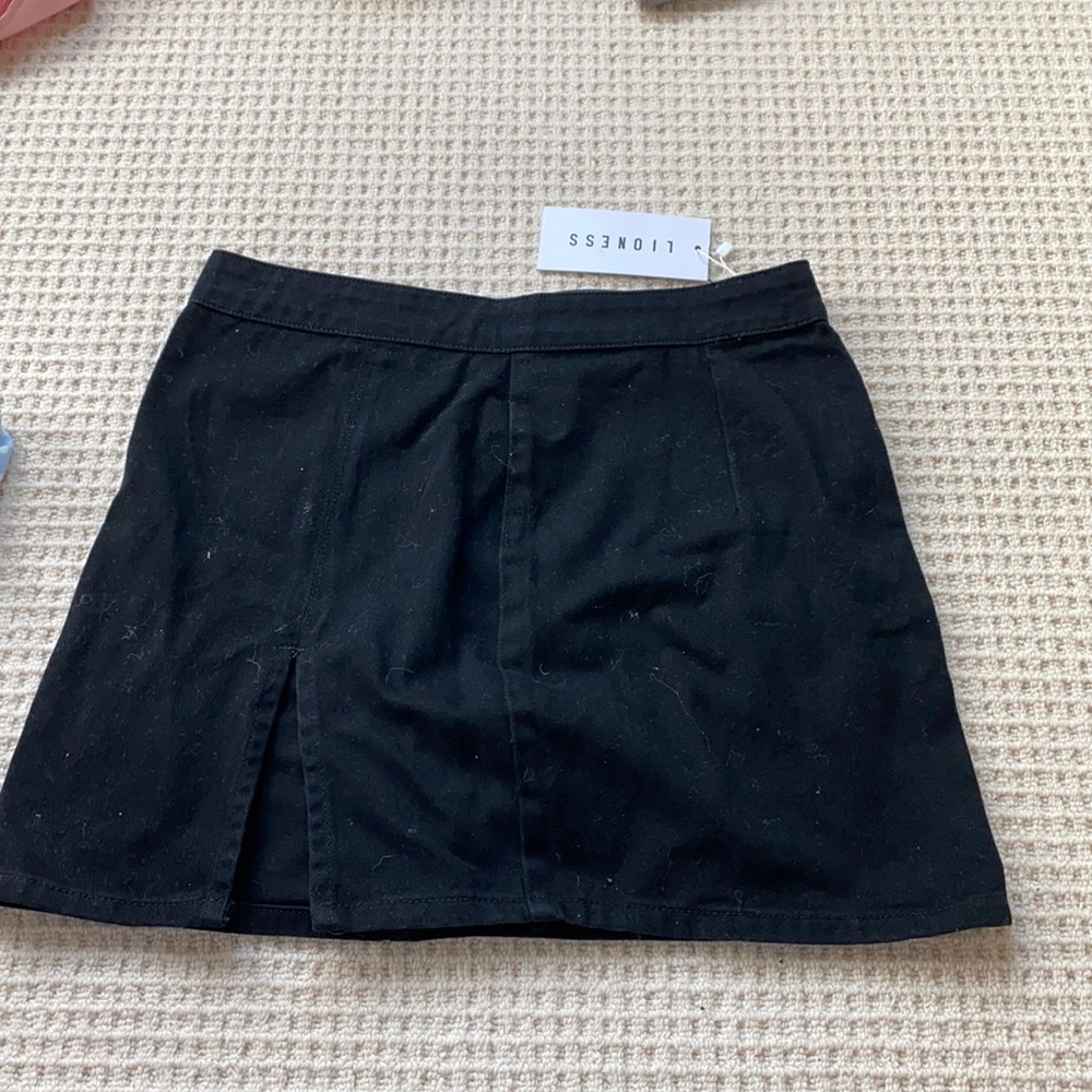 NEW WITH TAGS!! Black denim mini skirt with slit